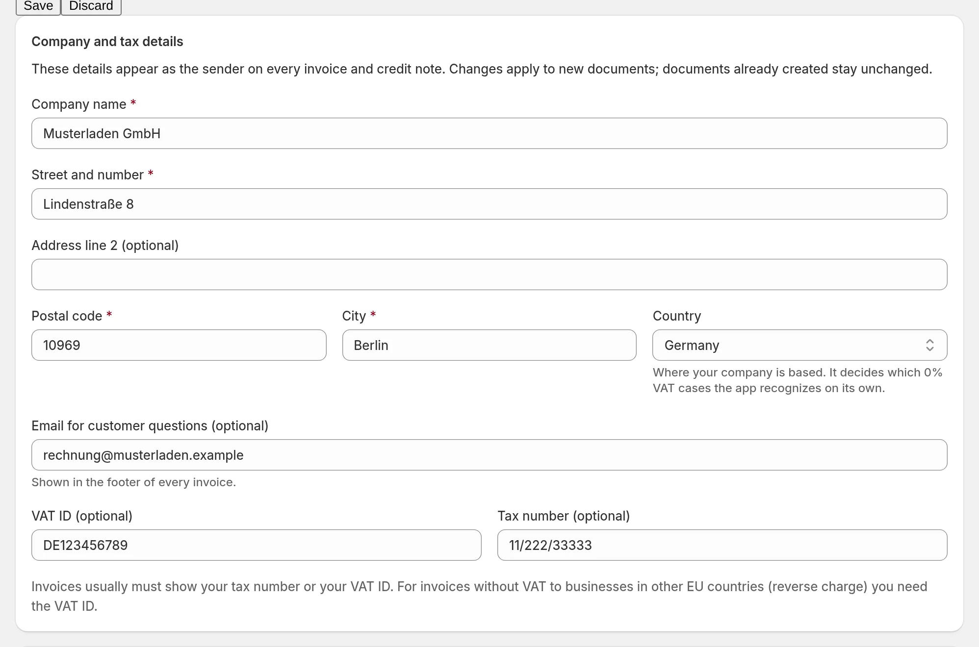 Settings section Company and tax details with company name, address, country, VAT ID and tax number